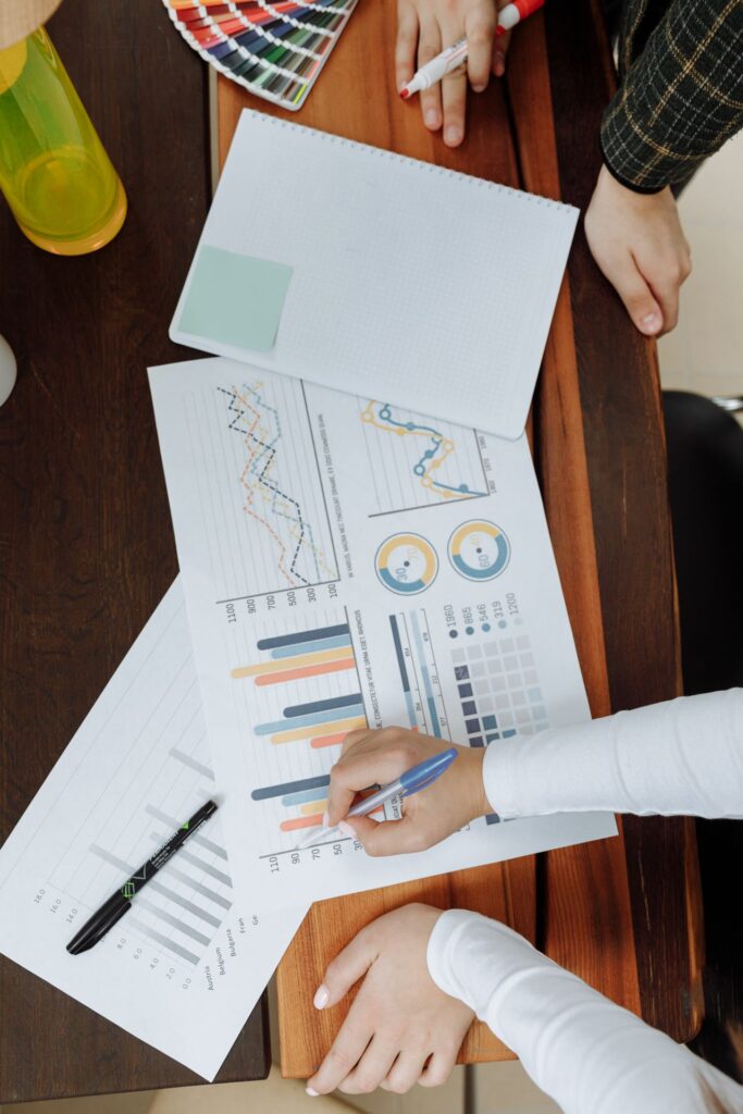 Marketing team analyzing digital campaign data