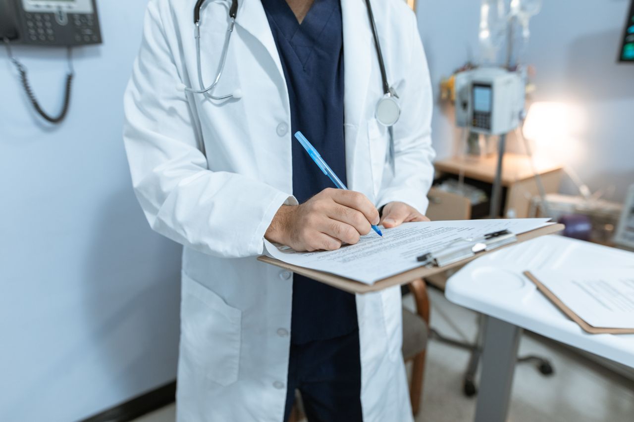 Healthcare provider reviewing medical billing documents