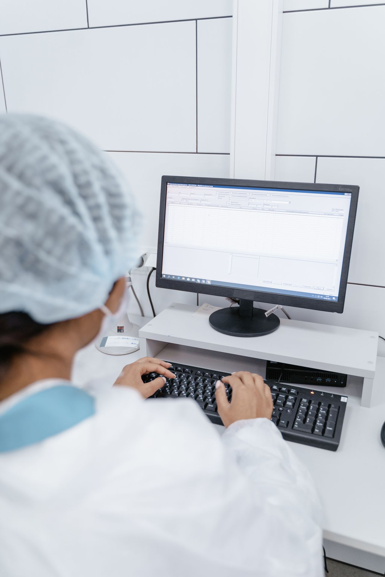 Healthcare staff reviewing medical coding frequently asked questions