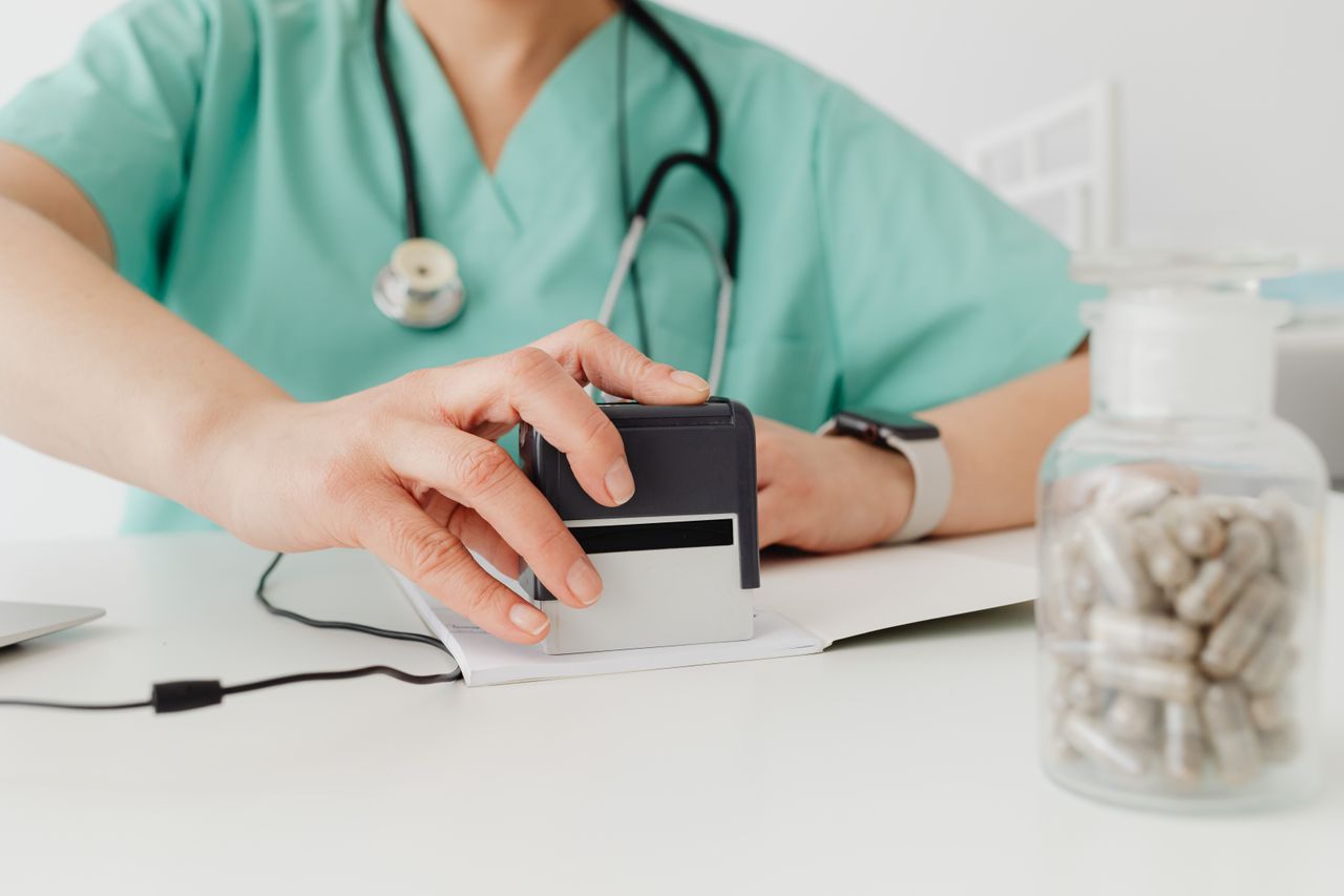 Healthcare provider using tablet for payment posting questions