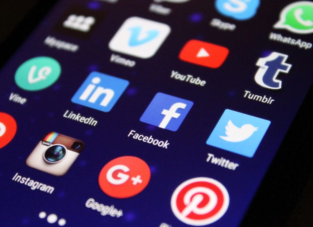 Smartphone displaying social media app icons
