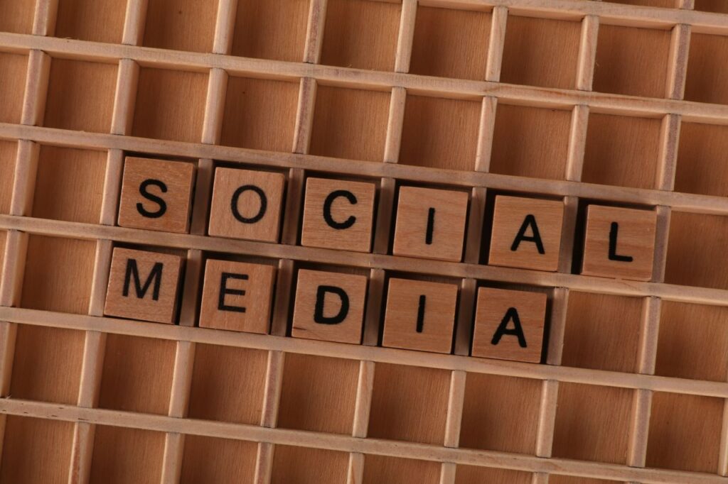 Wooden letter tiles spelling social media