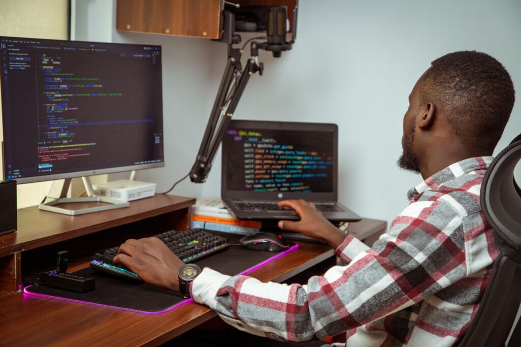 Person using a laptop for website development work